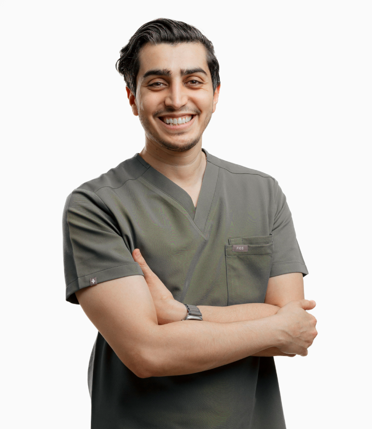 Dr. Haitham Al-Gzlan in consultation at Reveal Clinics